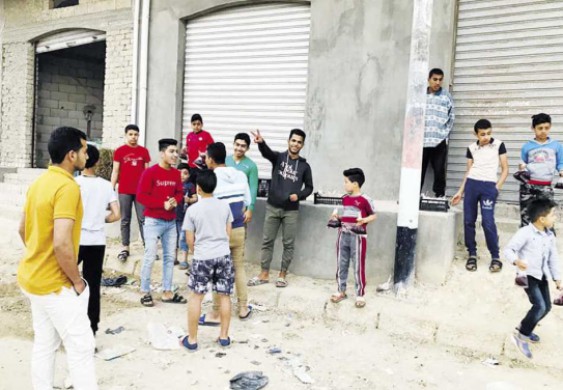 شباب العريش يوزّعون عصائر و«كنافة بالقشطة» على روح الشهيد أحمد منسي